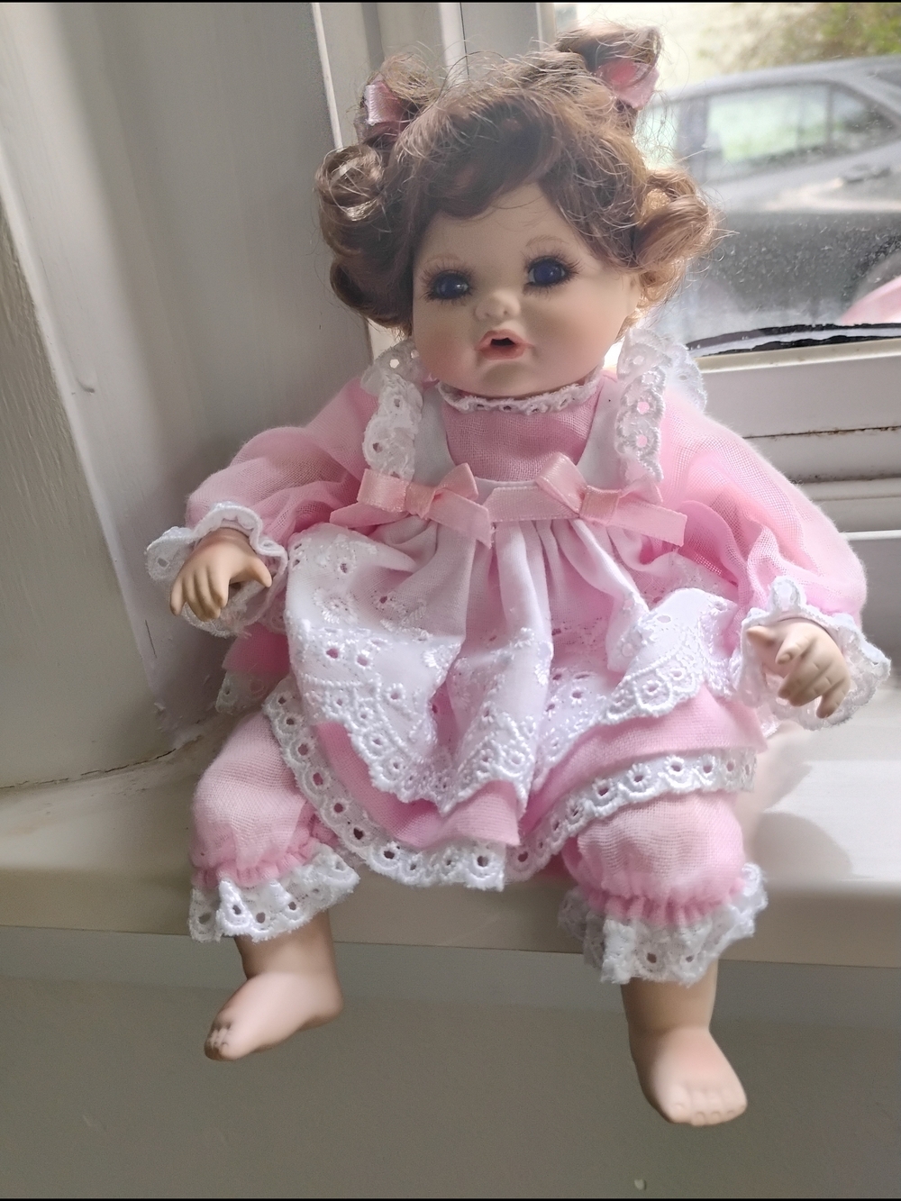 Miniature Porcelain Baby Doll with Frilled Dress